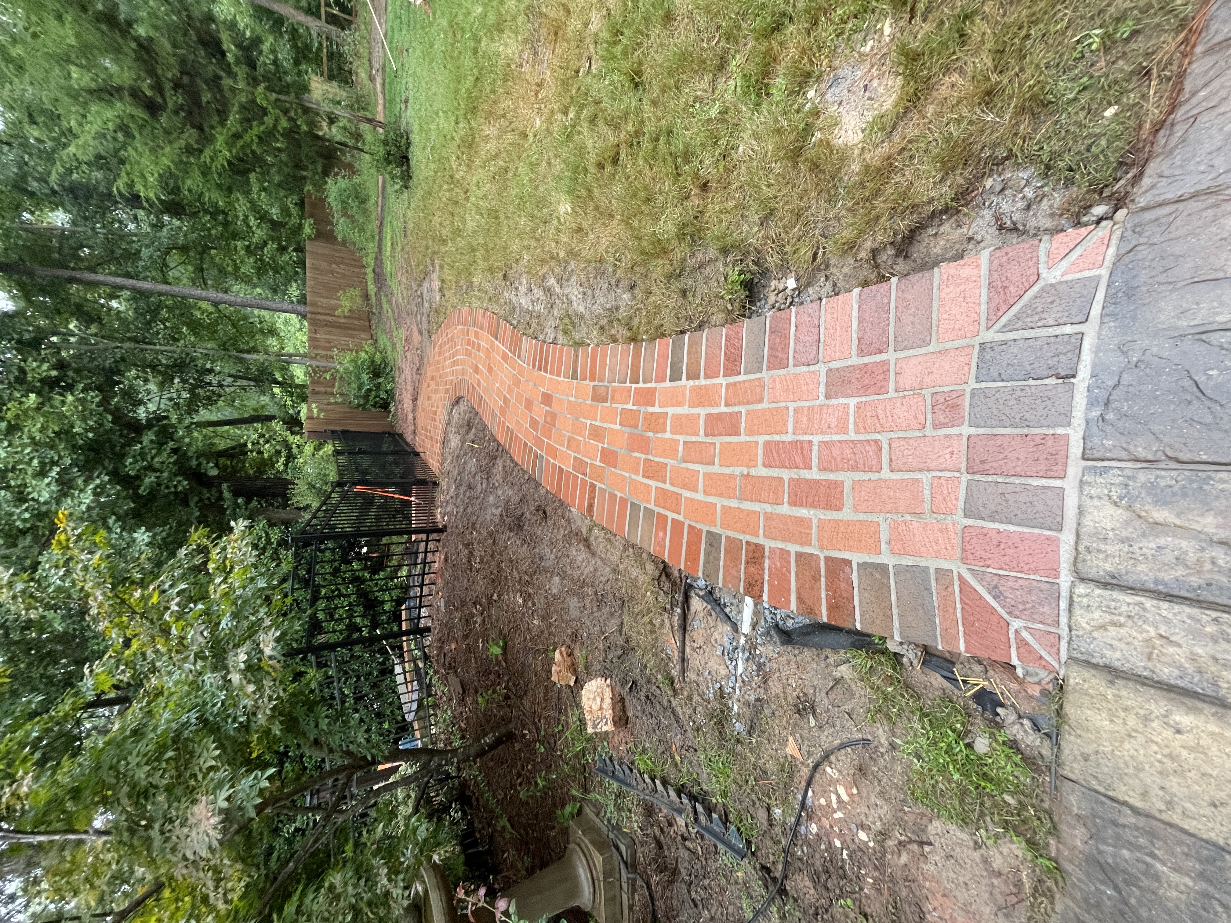 Curved brick walkway installation in South Carolina